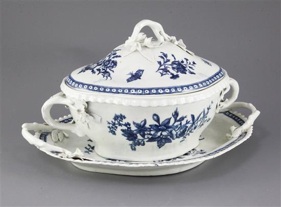 A Worcester lozenge shaped tureen cover and stand, c.1775, 34.5cm, losses to flowers and leaves